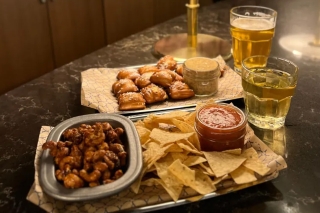 A tray of tempting food and beverages.