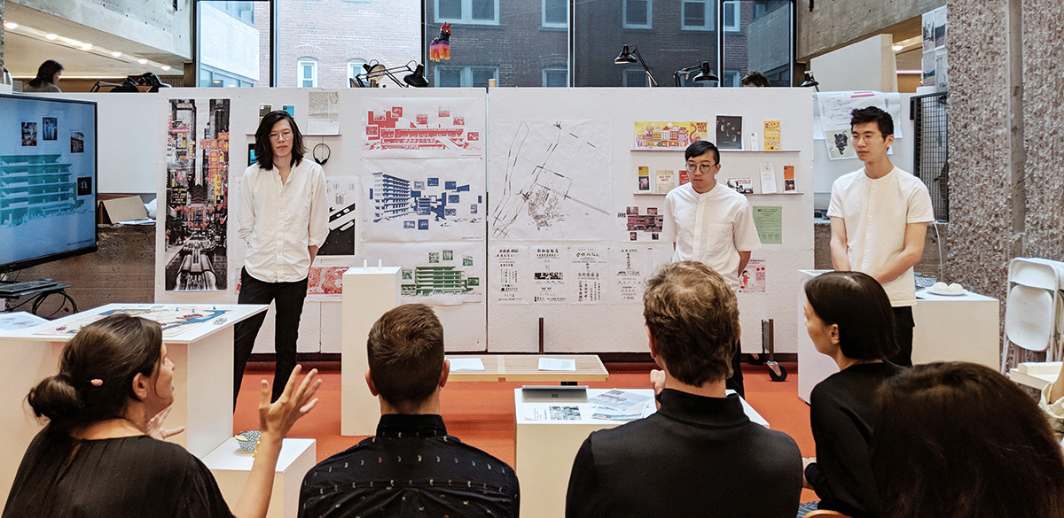 Liwei Wang and his two creative partners presenting their Chinatown Stories project