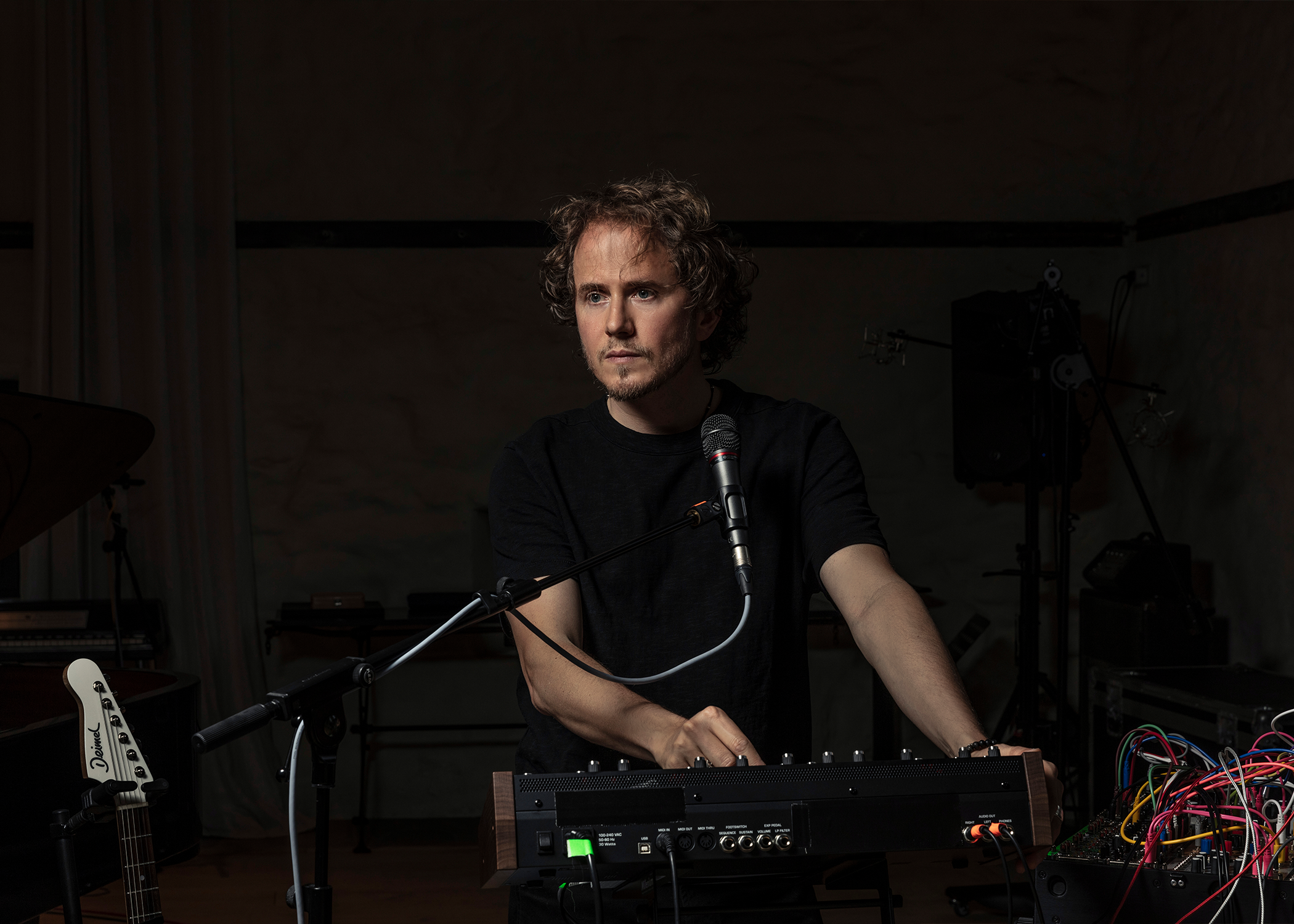 David Chalmin using electronic music equipment