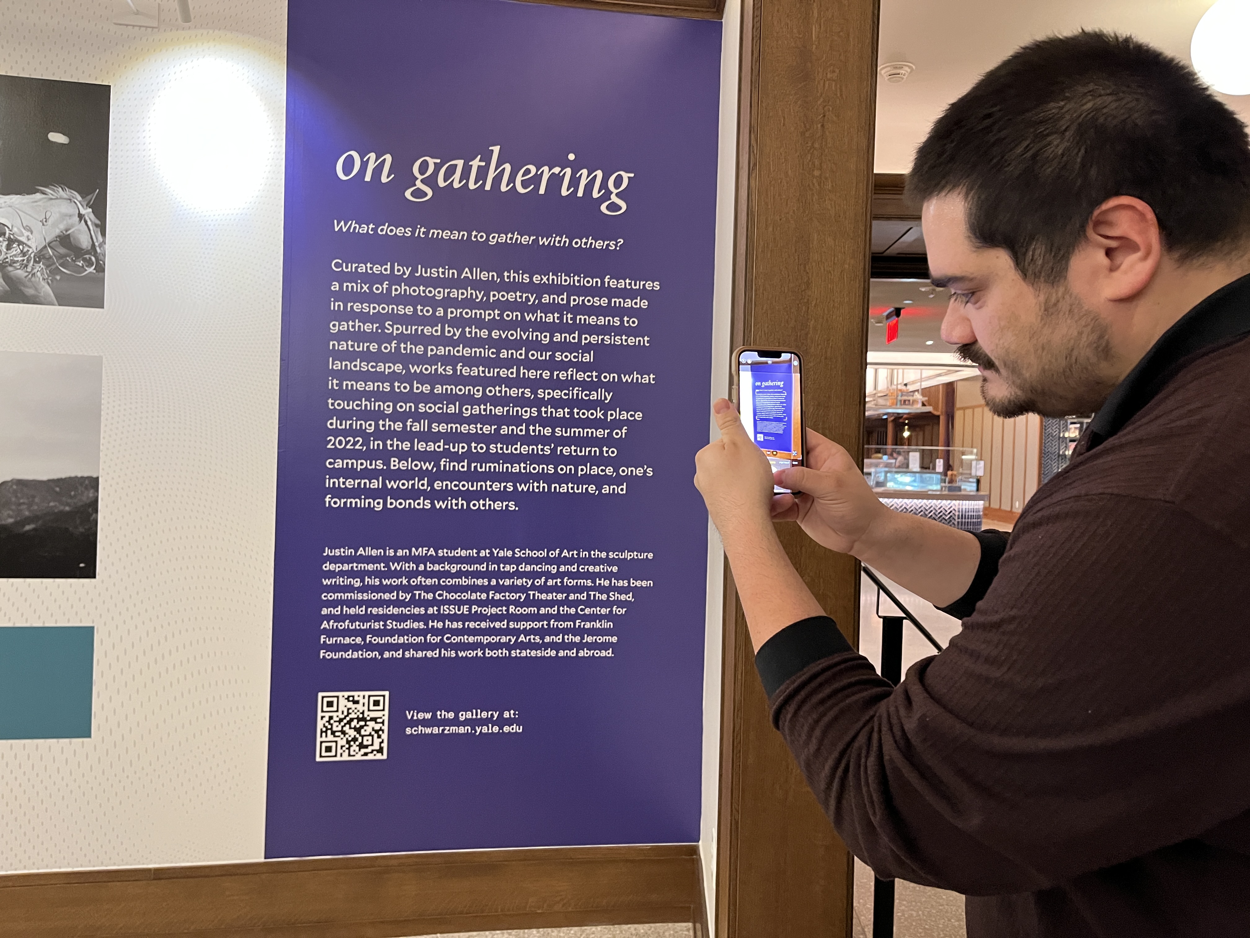 Meta image of someone taking an image of the exhibit.