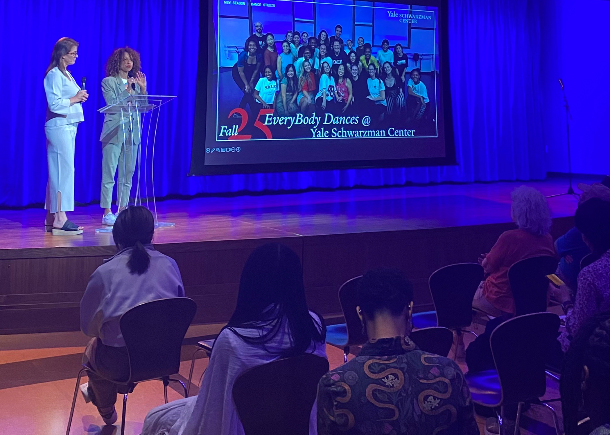 Stage in The Underground. Audience watches Season Launch announcement.