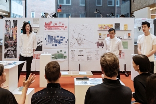 Liwei Wang and his two creative partners presenting their Chinatown Stories project