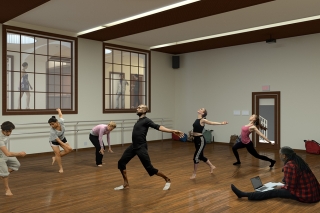 A group of dancers rehearsing in the dance studio.