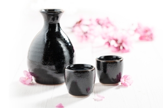 Pink Blossoms and black pottery.