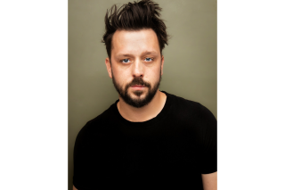 Portrait photography of a man wearing a black shirt