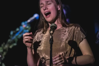 Woman singing. 