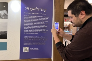Meta image of someone taking an image of the exhibit.