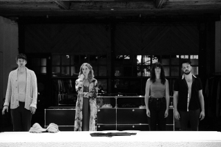 Black and white image on stage.