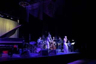 Members of the YUJC perform on stage.