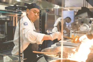 Cooking with flame. 
