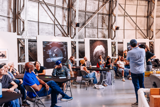People sitting together in a creative workspace.