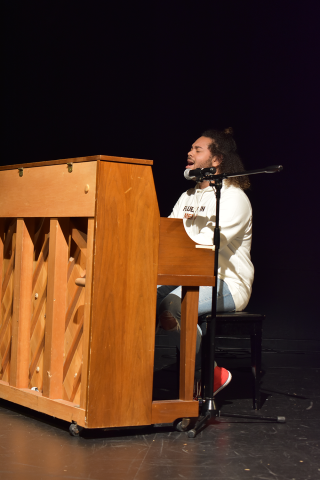 Student playing piano at 2019 LatinXcellence Showcase