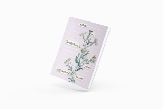 Book with flowers on the cover in pastel purples and greens.