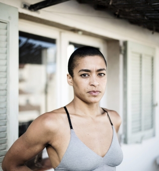 Dancer with short haircut, headshot.