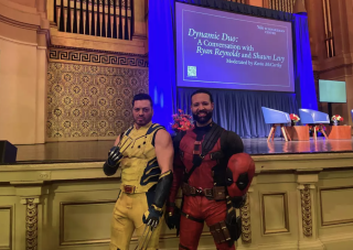 Two fans in costume.