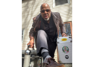 DJ with record cases.